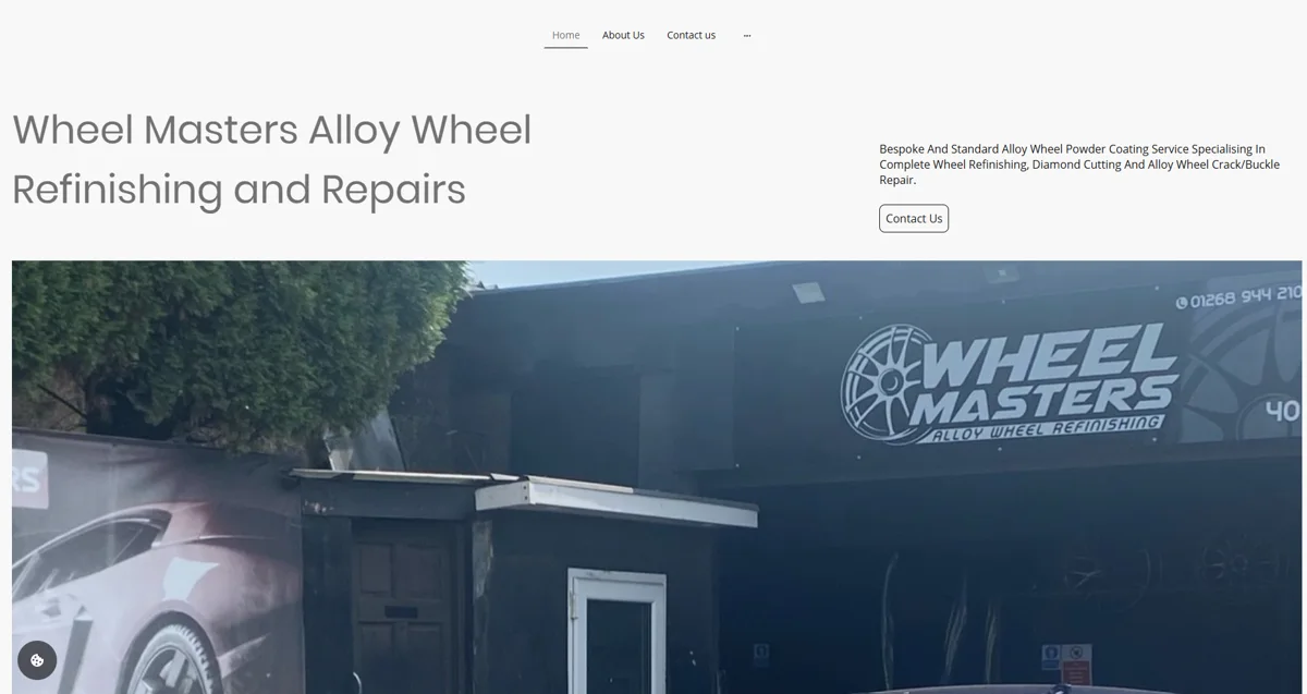 The old Wheel Masters website — a generic drag-and-drop template builder site with stock service cards