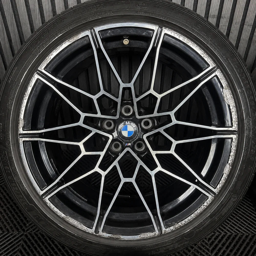 BMW M 20in — diamond cut face corroded and kerbed, before refurbishment